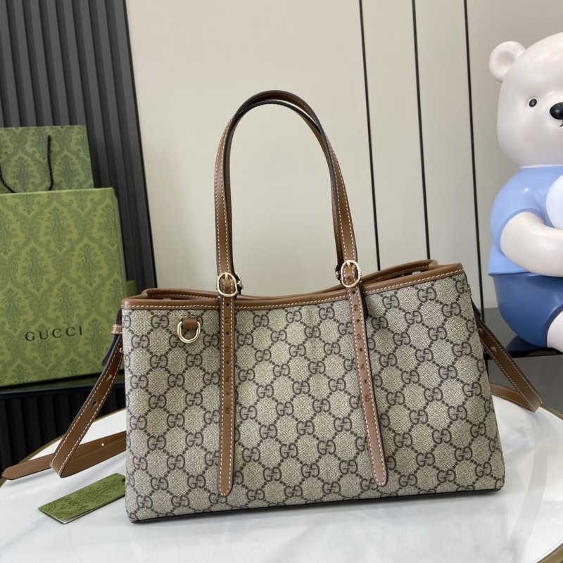 G*u*i shopping bags